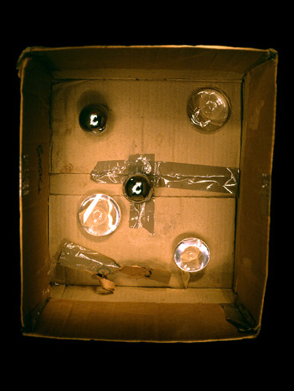 author: Jeremy Webb
title: box with lenses and balls